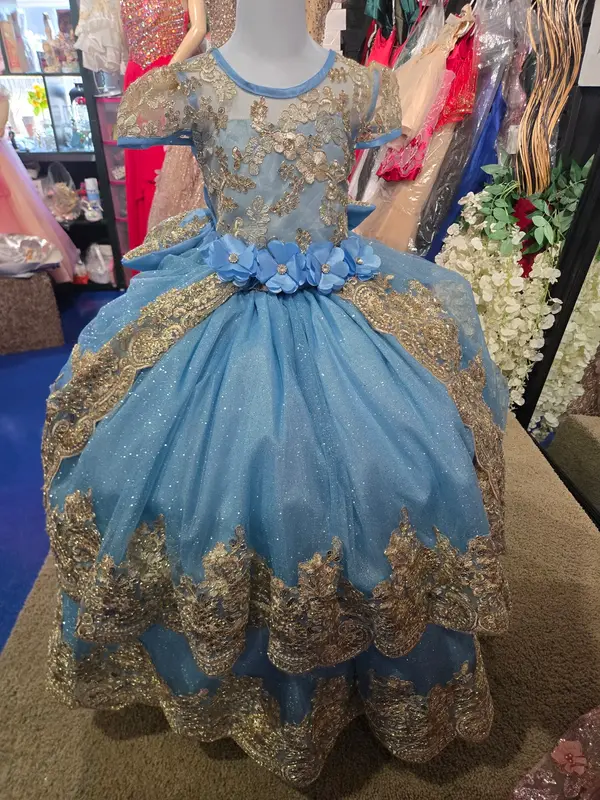 Vestido de niña azul real con bordado dorado